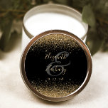 Gold Glitter Script Black Wedding Classic Round Sticker<br><div class="desc">This elegant modern wedding sticker features a faux gold glitter design on the top and bottom edge. Easily customise the gold-coloured text on a black background,  with the names of the bride and groom in handwriting calligraphy over a large ampersand.</div>