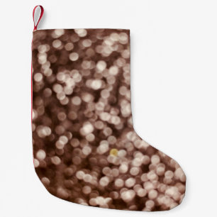 gold glitter texture background. Selective focus.S Small Christmas Stocking