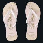 Gold Lace on Blush Pink The Bride Elegant Wedding Jandals<br><div class="desc">Dance the night away with these beautiful wedding flip flops. Designed for the bride, they feature a simple yet elegant design with gold coloured script lettering on a light blush pink background and fancy golden lace curls and swirls. Beautiful way to stay fancy and appropriate while giving your feet a...</div>