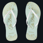 Gold Lace on Mint Green The Bride Elegant Wedding Jandals<br><div class="desc">Dance the night away with these beautiful wedding flip flops. Designed for the bride, they feature a simple yet elegant design with gold coloured script lettering on a light neo mint green coloured background and fancy golden lace curls and swirls. Beautiful way to stay fancy and appropriate while giving your...</div>