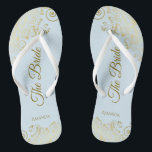 Gold Lace on Powder Blue The Bride Elegant Wedding Jandals<br><div class="desc">Dance the night away with these beautiful wedding flip flops. Designed for the bride, they feature a simple yet elegant design with gold coloured script lettering on a light powder blue background and fancy golden lace curls and swirls. Beautiful way to stay fancy and appropriate while giving your feet a...</div>