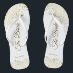 Gold Lace on White The Bride Elegant Wedding Jandals<br><div class="desc">Dance the night away with these beautiful wedding flip flops. Designed for the bride, they feature a simple yet elegant design with gold coloured script lettering on a white background and fancy golden lace curls and swirls. Beautiful way to stay fancy and appropriate while giving your feet a break after...</div>