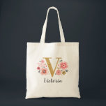 Gold Letter V Pink Floral Monogram Tote Bag<br><div class="desc">A beautiful,  feminine monogrammed pink floral tote bag featuring pink flowers and a faux gold monogram letter "V". Personalise the tote bag by adding your name underneath the monogram. Makes a fun gift for a friend or for a bridesmaid gift. Designed for you by Blackberry Boulevard.</div>