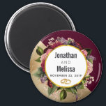 Gold Marble Pattern and Burgundy Florals Wedding Magnet<br><div class="desc">A wedding favour / save the date magnet. Designed with a golden marble pattern and a solid burgundy colour layered diagonally together. A circle with a faux gold foil border which is layered over a pretty floral bouquet with roses, carnations and other flowers. A pair of wedding rings inside the...</div>