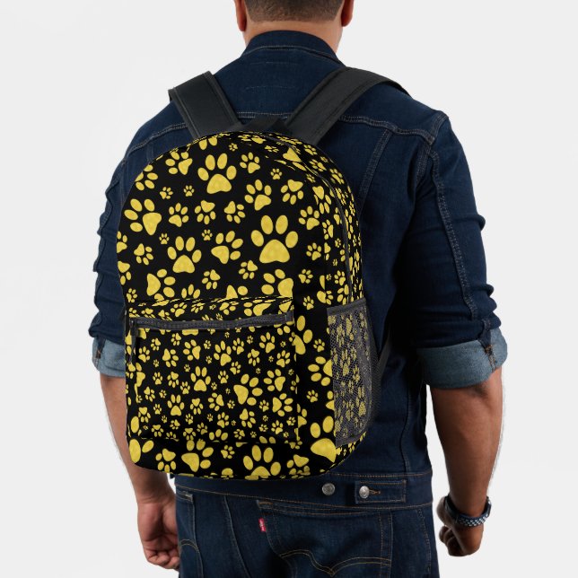 Gold metal pattern paws on black background printed backpack (Insitu (Model))