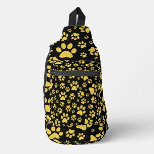 Gold metal pattern paws on black background sling bag
