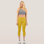 Gold Metallic solid plain colour Capri Leggings<br><div class="desc">Populaire,  luxury attractive colour design. 
Wok on many occasions even on the beach.
Work with lots of combinations of colours Green,  blue and more.
Vital,  vibrant,  fashionable,  smooth,  shiny texture colour.
Hex No is D8B00E</div>