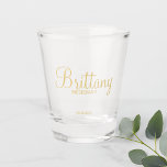Gold Modern Script Personalised Bridesmaids Shot Glass<br><div class="desc">Modern Personalised Bridesmaids Shot Glass featuring personalised bridesmaid's name in gold modern calligraphy font style with title and wedding date in gold modern sans serif font style. Also perfect for maid of honour, flower girl, mother of the bride, groomsman, best man, father of the bride and more. Please Note: The...</div>