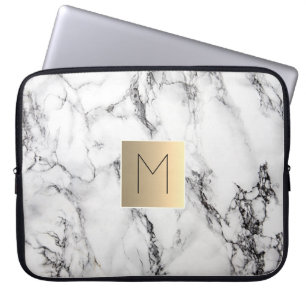 gold monogram on marble laptop sleeve