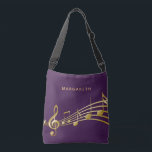 Gold music notes purple musician name crossbody bag<br><div class="desc">Simple and elegant for a music lover or musician!  Chic purple background with faux gold music notes. Template for your name,  golden letters.</div>