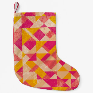 Gold neon background, colourful light effects. small christmas stocking