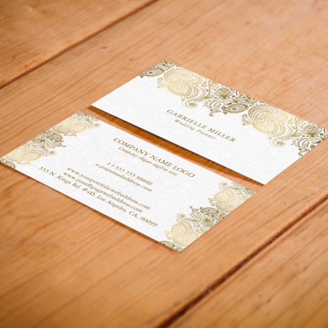 Gold paisley border on white wedding planner business card (Creator Uploaded)