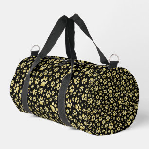 Gold pattern paws on black background duffle bag