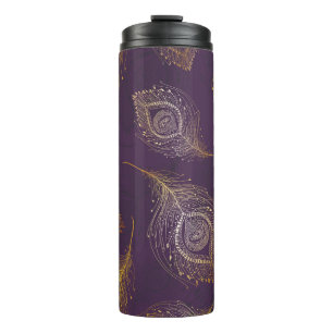 Gold peacock feather, violet background. thermal tumbler