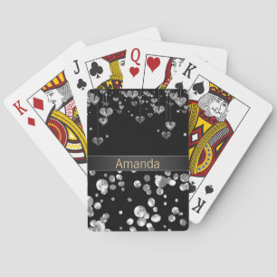 Gold polka dots on a black background . playing ca cards