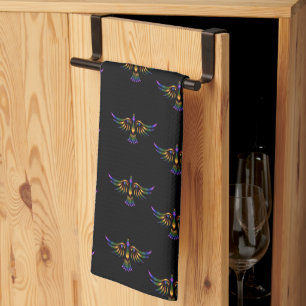 Gold, purple and green abstract bird on black tea towel