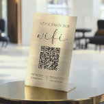 Gold QR Code Please Enjoy Our Wifi Pedestal Sign<br><div class="desc">Introducing our QR Code White "Please Enjoy Our WiFi" Pedestal Sign – a contemporary blend of hospitality and technology designed to enhance your visitors' experience. This elegant white pedestal sign is more than just a decorative element; it's an invitation to connectivity. With a dynamic QR code prominently displayed, guests can...</div>