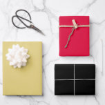 Gold Red Black Wrapping Paper Sheets<br><div class="desc">Solid gold wrapping paper,  solid red wrapping paper and a solid black wrapping paper. A trio of beautiful wrapping papers for birthday gifts,  Christmas gifts and more.</div>