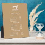 Gold Sewing Machine Seamstress Beige pricing Plaque<br><div class="desc">Understated design displays your services, price list or business information beneath an illustration of a vintage sewing machin in faux gold over a beige background and your name or business name. Includes three customizable headings and body text fields. To adjust layout, enter your text and then use the Customize function...</div>