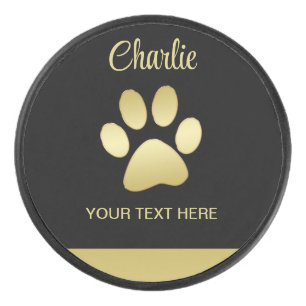 Gold Shiny Dog Paw on black background Hockey Puck