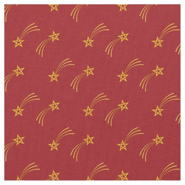 Gold shooting star on red fabric (Close Up)