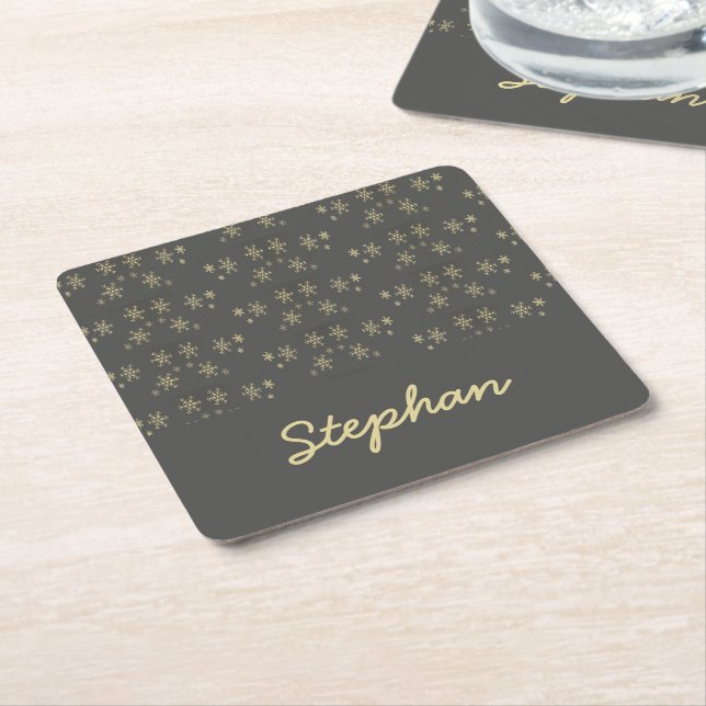 Gold snowflakes on grey square paper coaster (Angled)