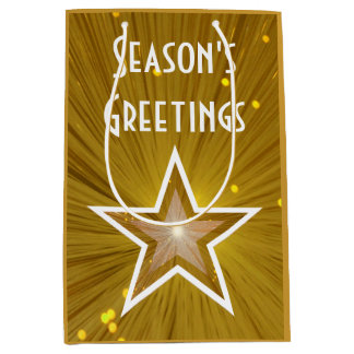 Gold Star print Season's Greetings gift bag medium