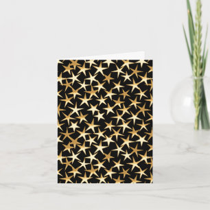 Gold stars on a black background holiday card