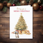 Gold Tree Shih Tzu Dog Christmas Card<br><div class="desc">On the front of this Christmas card, an adorable Shih Tzu Dog wears a red and white Santa hat and sits in front of a Holiday tree. The tree is decorated in gold, and matching gift packages are beneath it. The gold and red text says "Wishing you a MERRY CHRISTMAS"....</div>