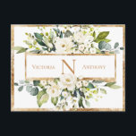 Gold White Monogram Floral Greenery Save the Date Postcard<br><div class="desc">Elegant cream and ivory flowers surrounded with lovely lush greenery.  Front and back are featured with names of bride and groom and monogram in golden colour.  Gold trim finishes this beauty off with elegance at its best. Just beautiful. Budget postcard.</div>