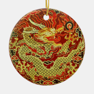 Golden asian dragon embroidered on dark red ceramic tree decoration