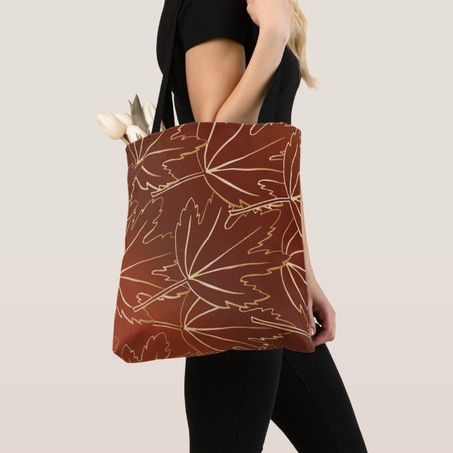 Golden autumn leaves pattern on brown tote bag (Close Up)