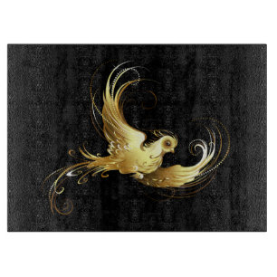 Golden Bird on Black Background Cutting Board