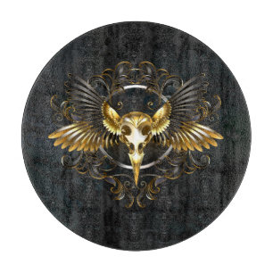 Golden Bird Skull on Black background Cutting Board