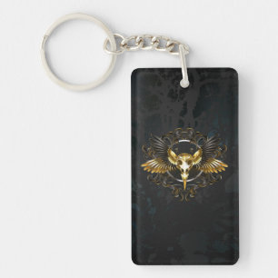 Golden Bird Skull on Black background Key Ring