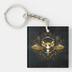 Golden Bird Skull on Black background Key Ring