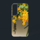 Golden Blossom Beauty Samsung Galaxy Case<br><div class="desc">Bright golden flowers hanging among fresh green leaves create a beautiful and peaceful scene of nature. The vibrant yellow blooms look like a natural waterfall of flowers, spreading warmth and charm. This lovely view shows the simple yet stunning beauty of nature, where every petal and leaf comes together like a...</div>