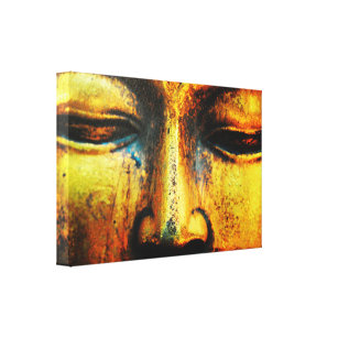 Golden Bronze Statue of the Buddhas Face Canvas Print