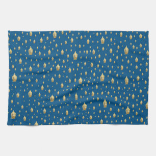 golden buddha in blue tea towel