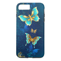 Golden Butterflies on a Blue Background