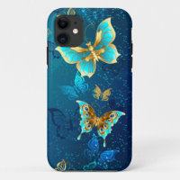 Golden Butterflies on a Blue Background