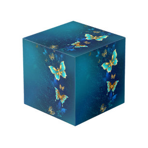 Golden Butterflies on a Blue Background Cube