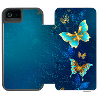 Golden Butterflies on a Blue Background
