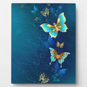 Golden Butterflies on a Blue Background Plaque
