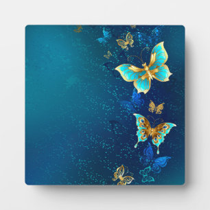 Golden Butterflies on a Blue Background Plaque
