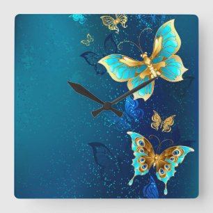 Golden Butterflies on a Blue Background Square Wall Clock