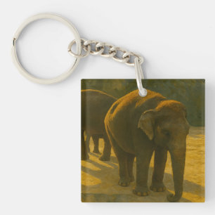 Golden Companions – Elephant Trio in Warm Light Key Ring