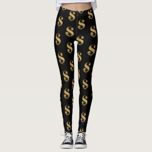 Golden Dollar Signs on Black Leggings