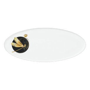 Golden dragonfly in black circle name tag