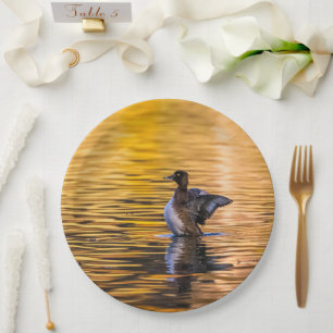 Golden eye on a golden lake paper plate